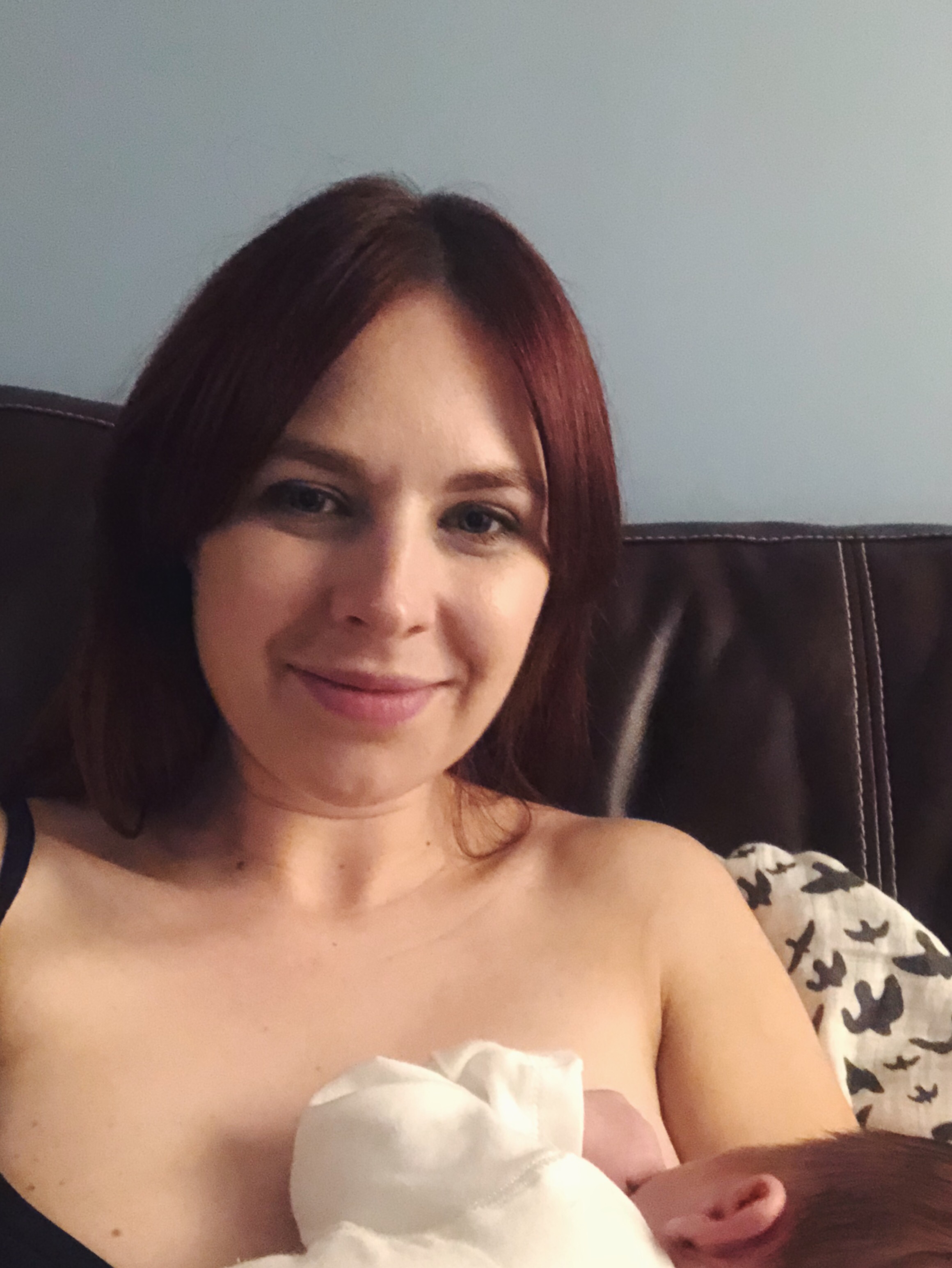Mother and baby breastfeeding 