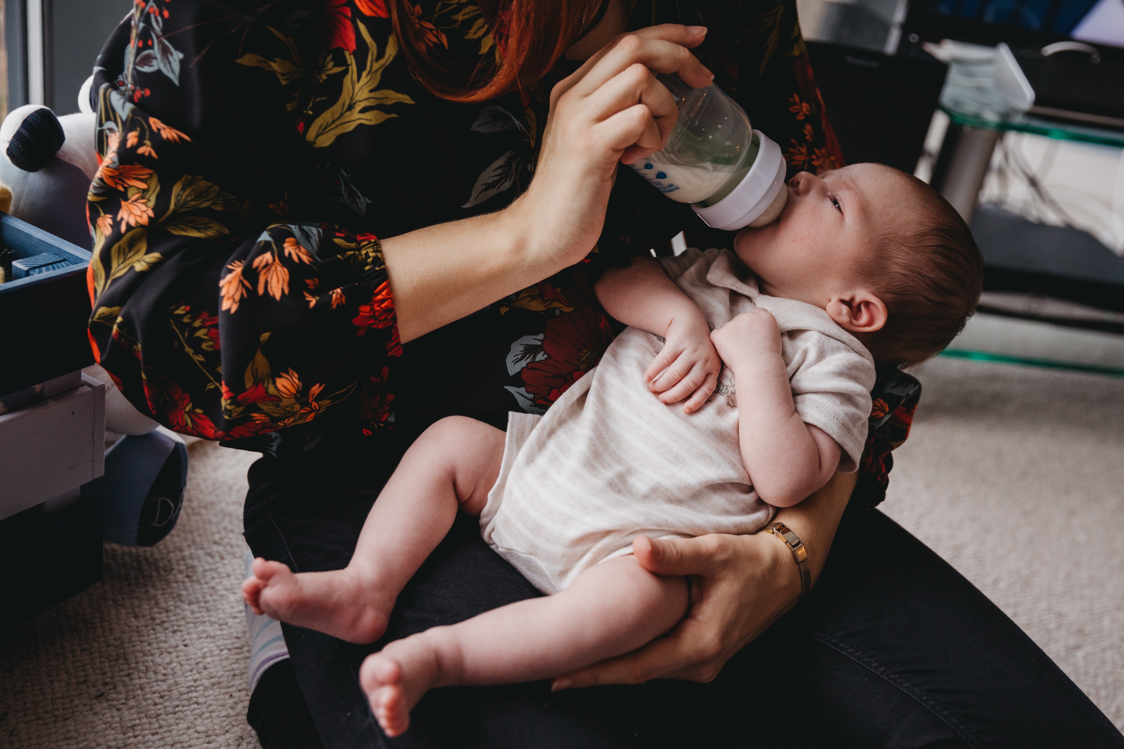 Mother and baby bottle feeding