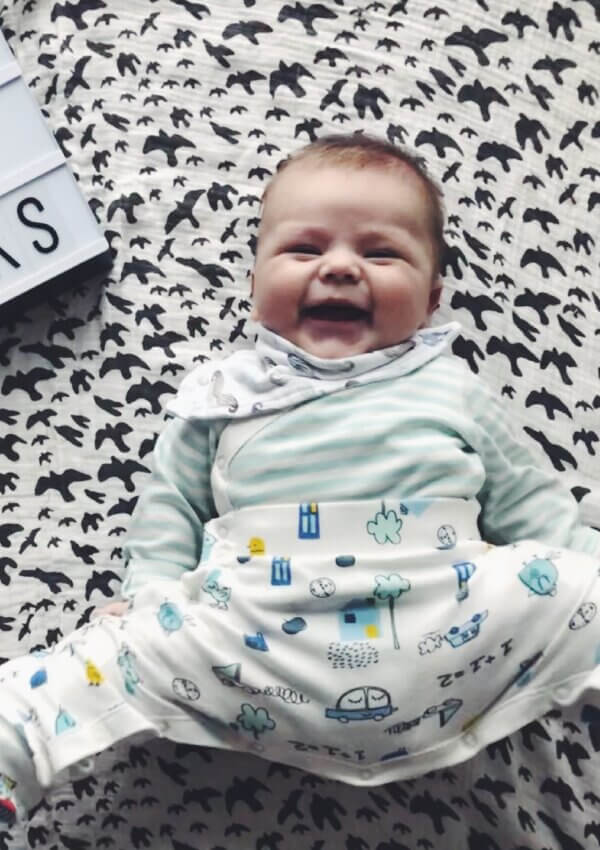 Hip dysplasia car seats, nappy changes and playtime for a baby in a Pavlik harness