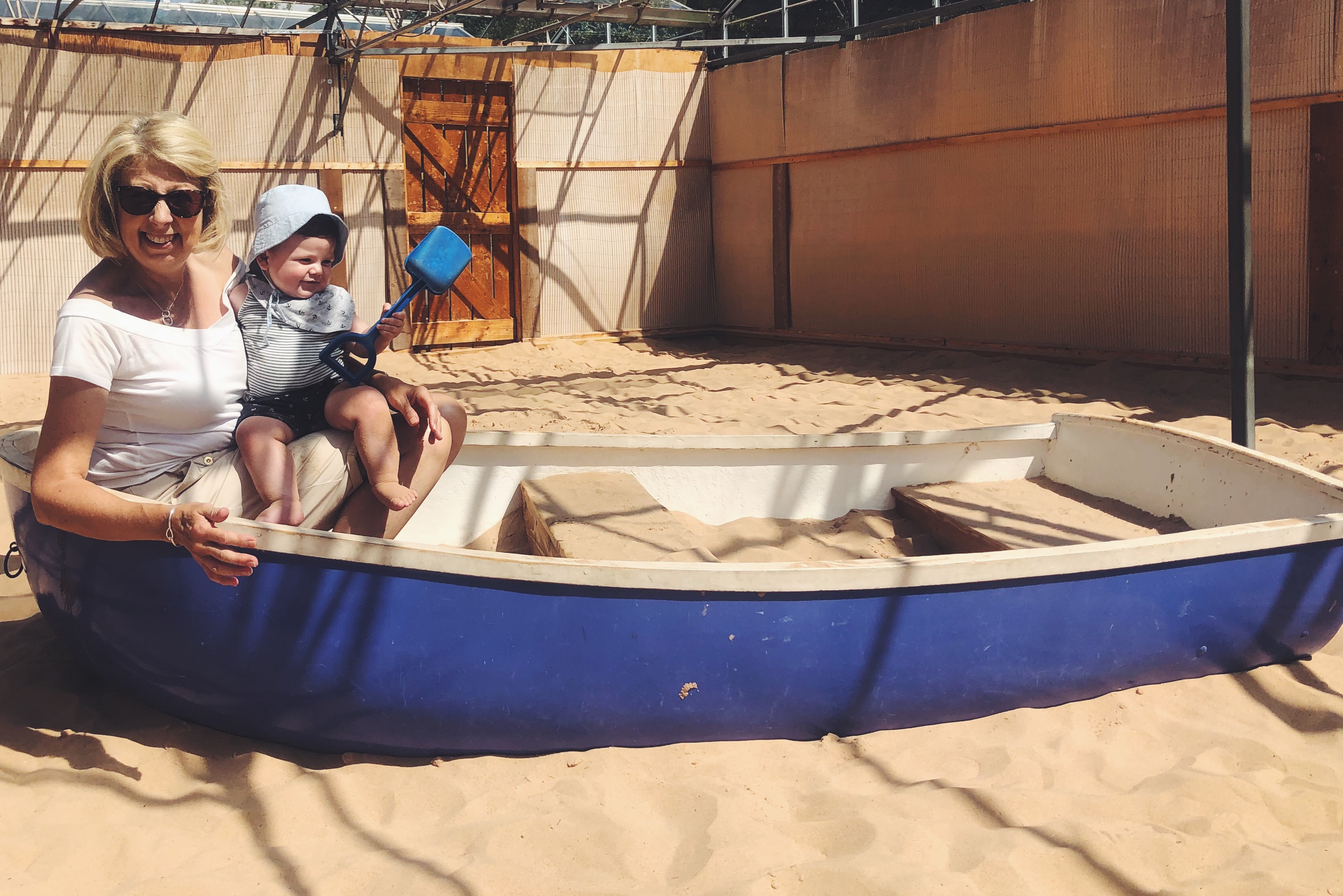 Baby, sand pit, boat