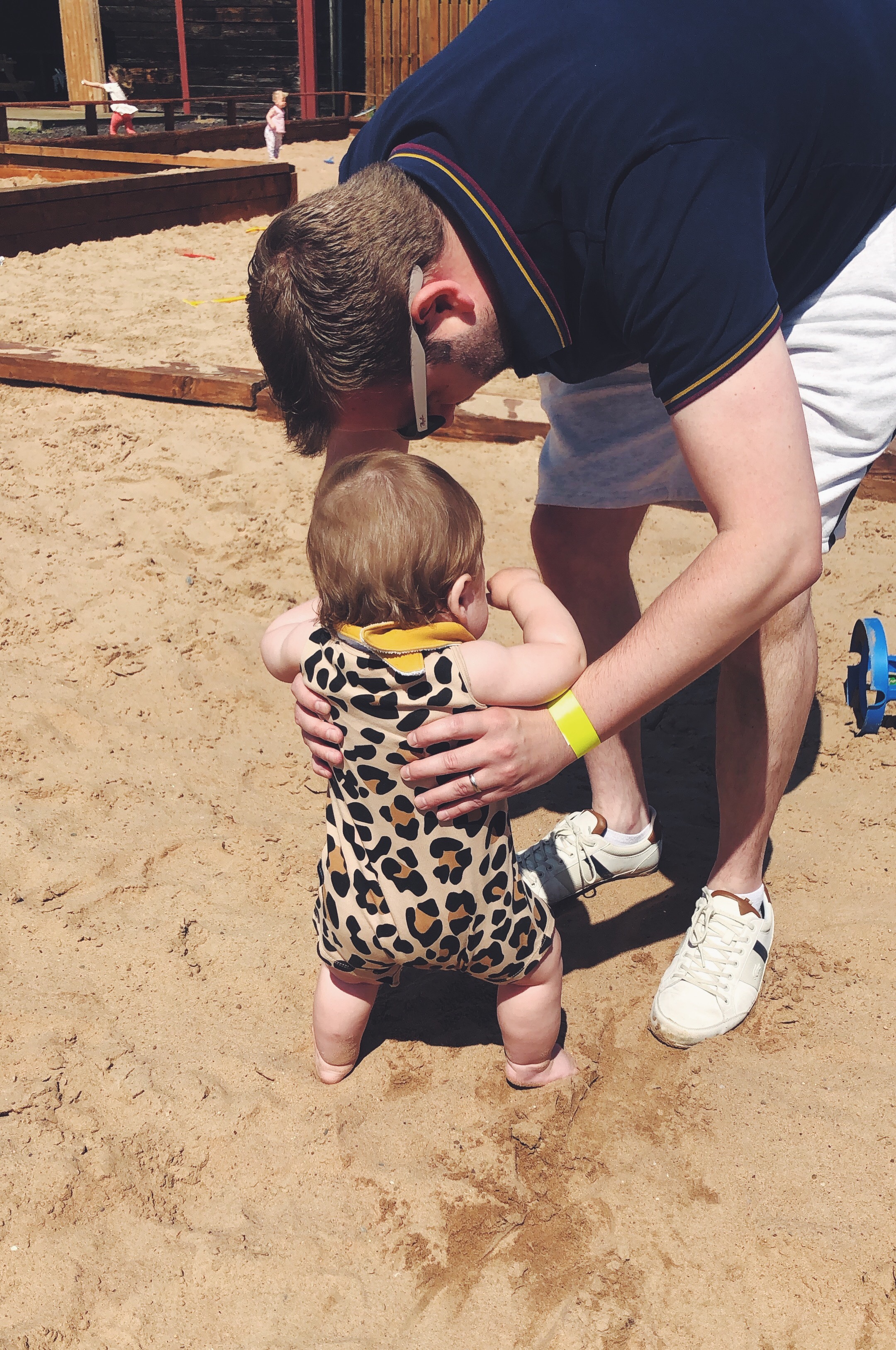 Baby in a sand pit